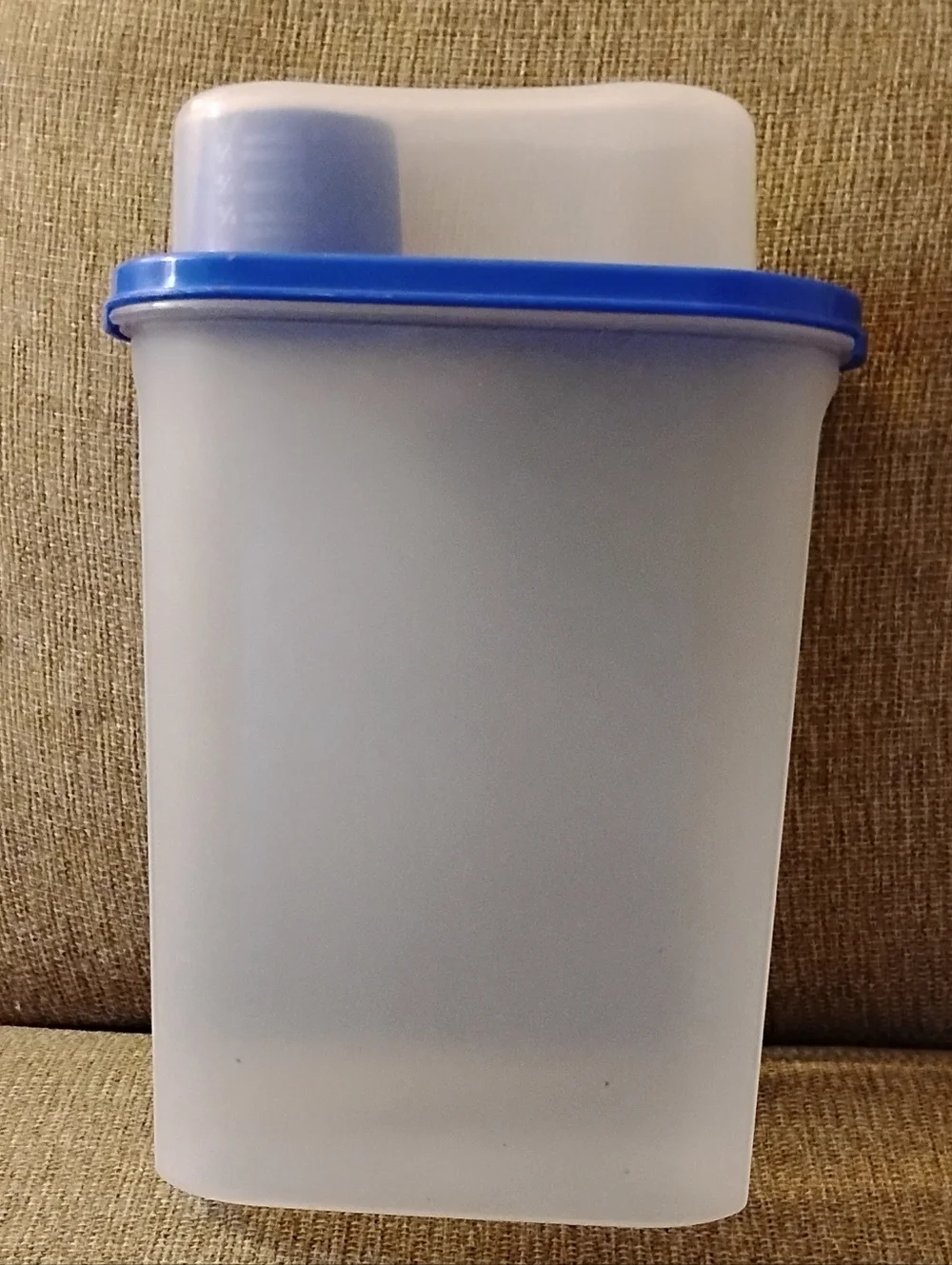 Tupperware container (2.3 litter,) , top holds 8 oz